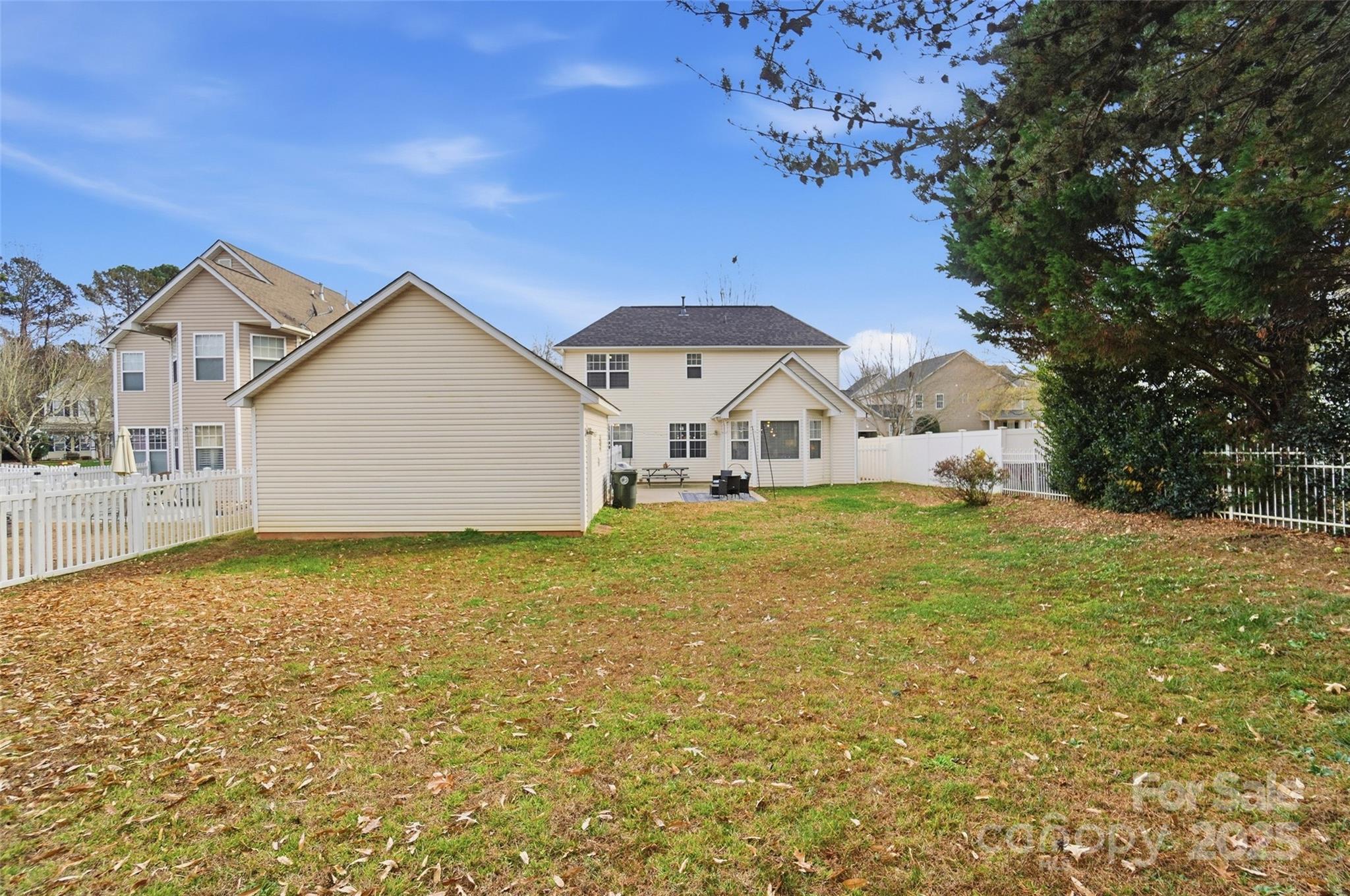 10432 Watoga Way Cornelius, NC 28031 - Photo 39 of 42 a view of a house with backyard and garden