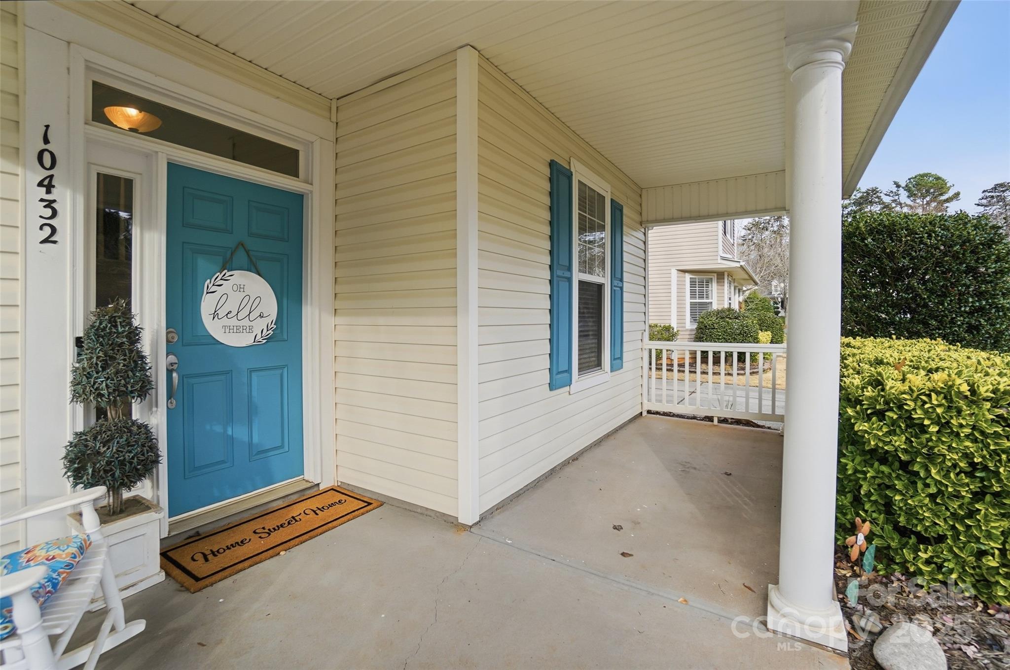 10432 Watoga Way Cornelius, NC 28031 - Photo 6 of 42 a view of a hallway with entryway and wooden floor
