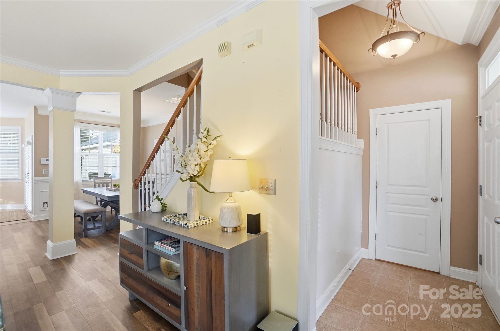 10432 Watoga Way Cornelius, NC 28031 - Photo 8 of 42 a view of entryway livingroom and hall with wooden floor