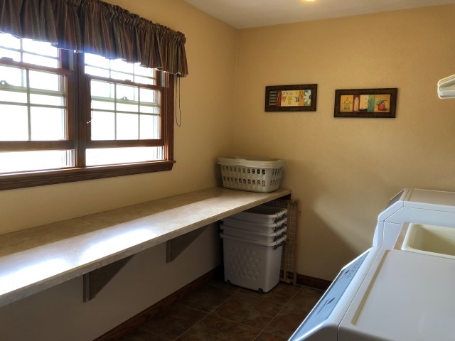 6609 Tipple Road Rockford, IL 61102 - Photo 15 of 25 a room with wooden floor and window