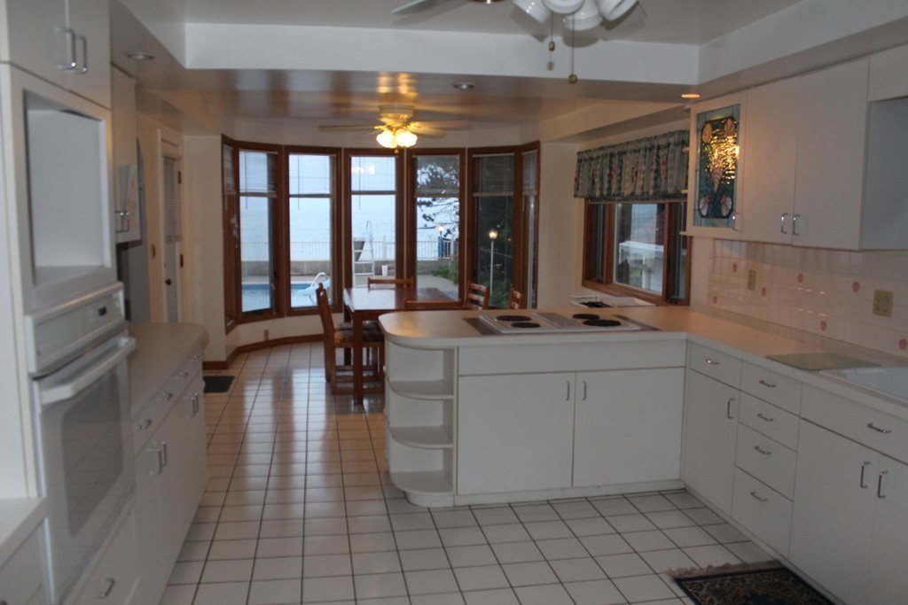 145 Puritan Road Swampscott, MA 01907 - Photo 6 of 19 a very nice looking room with wooden floor and furniture