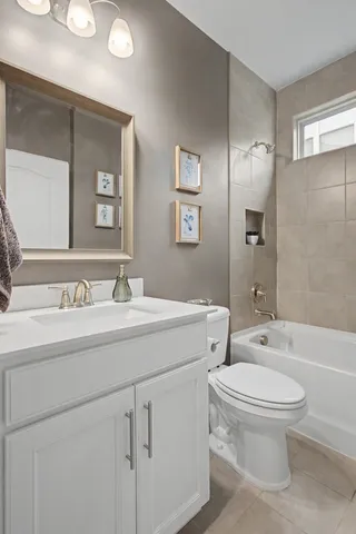 a kitchen with a sink and stainless steel appliances