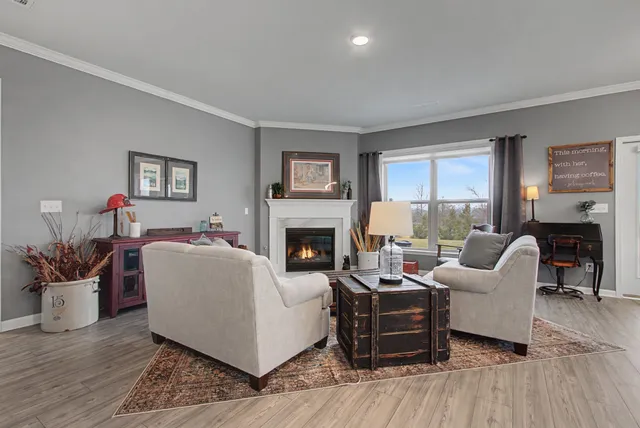 a spacious bedroom with a bed and a couch