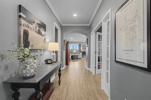 a workspace with furniture and a book shelf