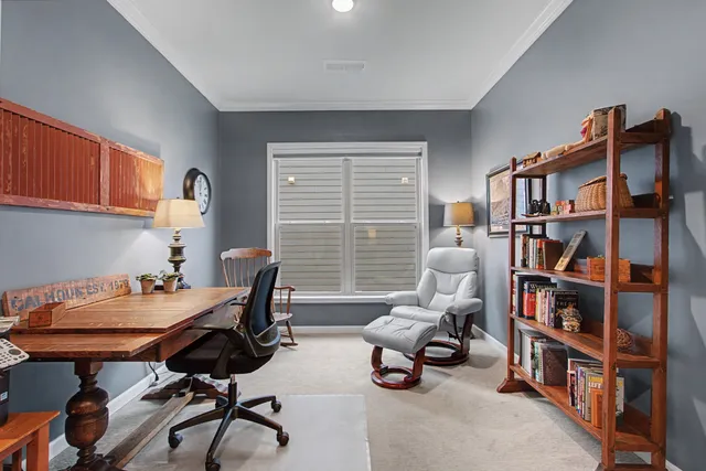 a bathroom with a toilet sink a shower and a mirror