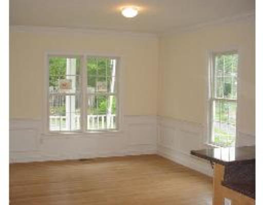 119 Westgate Road Waltham, MA 02453 - Photo 6 of 9 an empty room with a window
