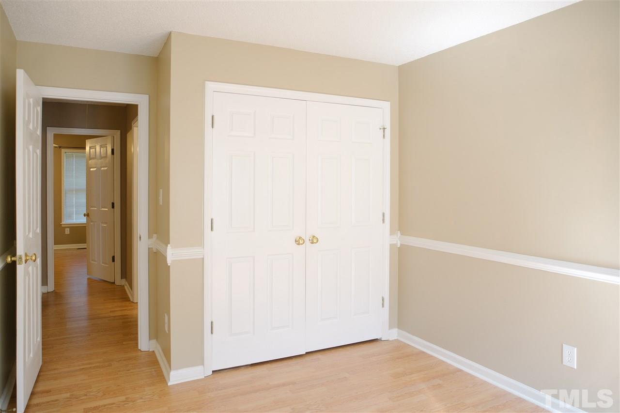 7244 Turner Fish Road Willow Spring, NC 27592 - Photo 15 of 18 a view of a small space with wooden floor