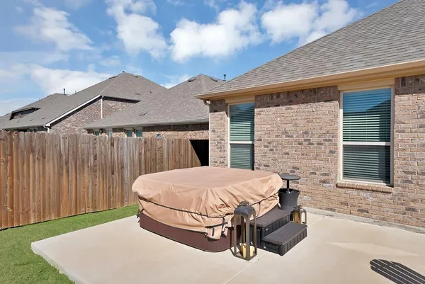 a front view of a house with patio