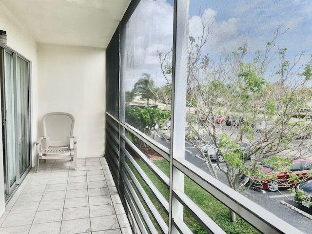 145 Brighton D Boca Raton, FL 33434 - Photo 13 of 27 Screened Patio and View