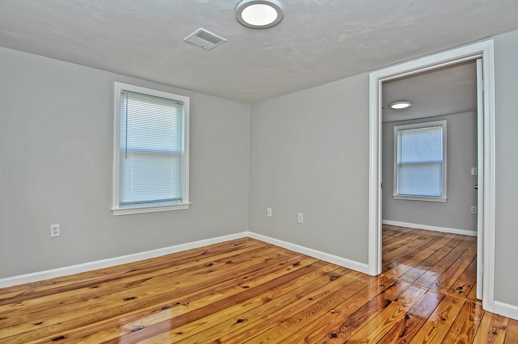65 Edgewater Avenue Shrewsbury, MA 01545 - Photo 16 of 24 a view of empty room with wooden floor
