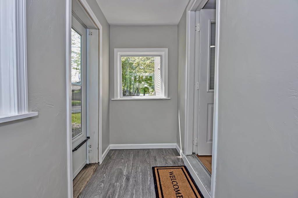 65 Edgewater Avenue Shrewsbury, MA 01545 - Photo 18 of 24 wooden floor in an empty room with a window