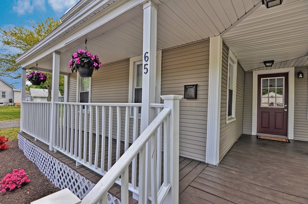 65 Edgewater Avenue Shrewsbury, MA 01545 - Photo 2 of 24 a view of balcony and wooden floor