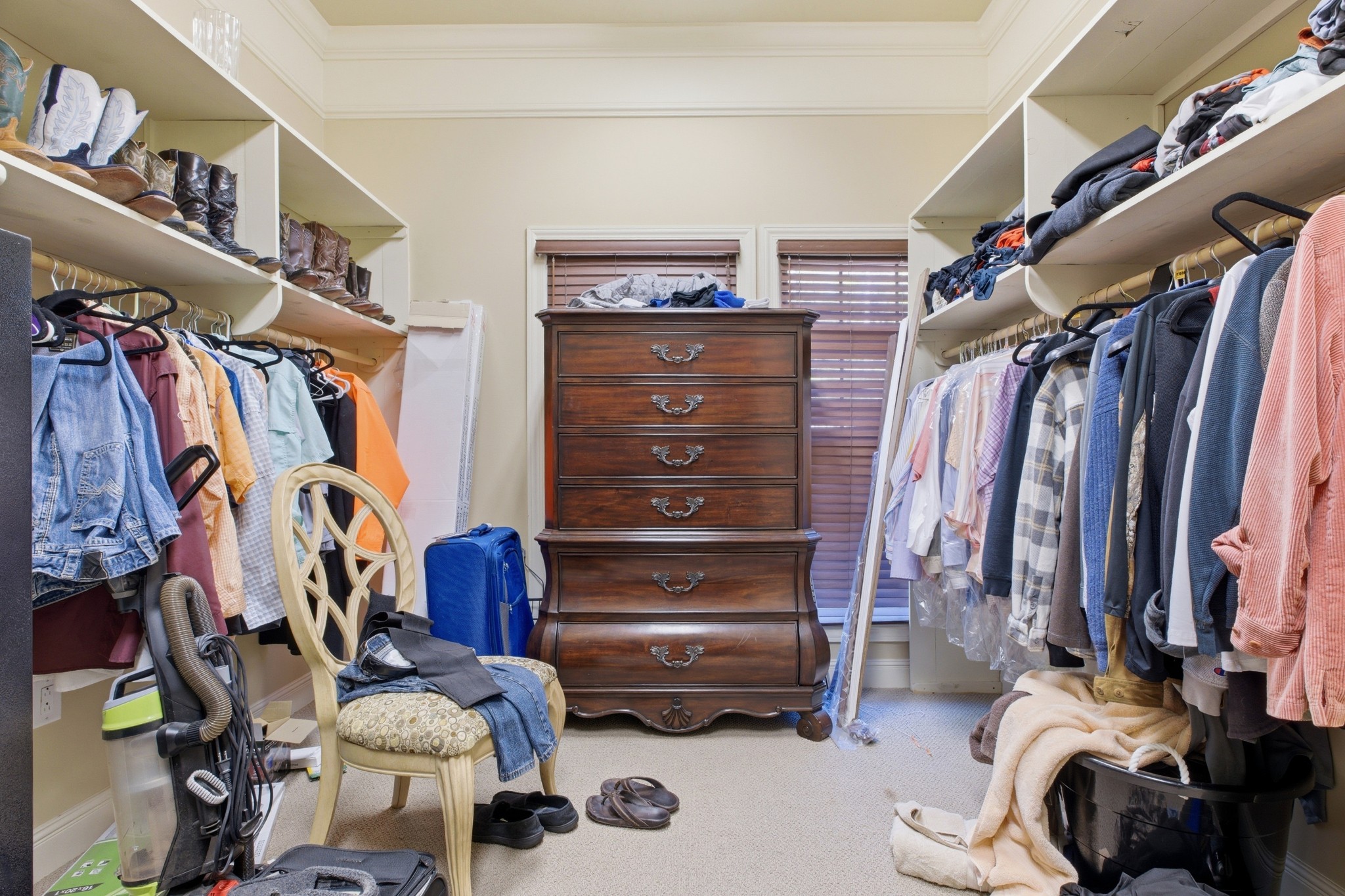 1605 Puryears Bend Road Hartsville, TN 37074 - Photo 16 of 63 a view of walk in closet with clothes and shoes