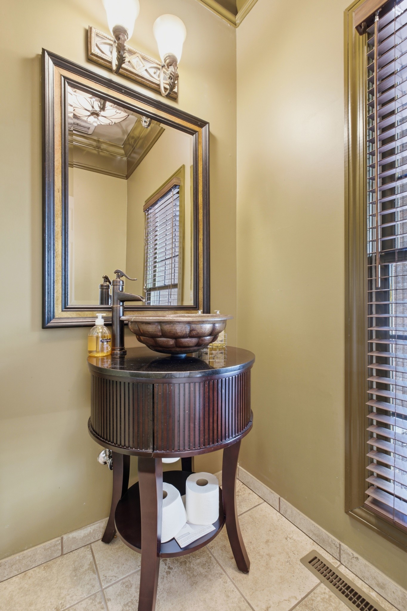 1605 Puryears Bend Road Hartsville, TN 37074 - Photo 19 of 63 a view of a room that has a table and a dresser in it