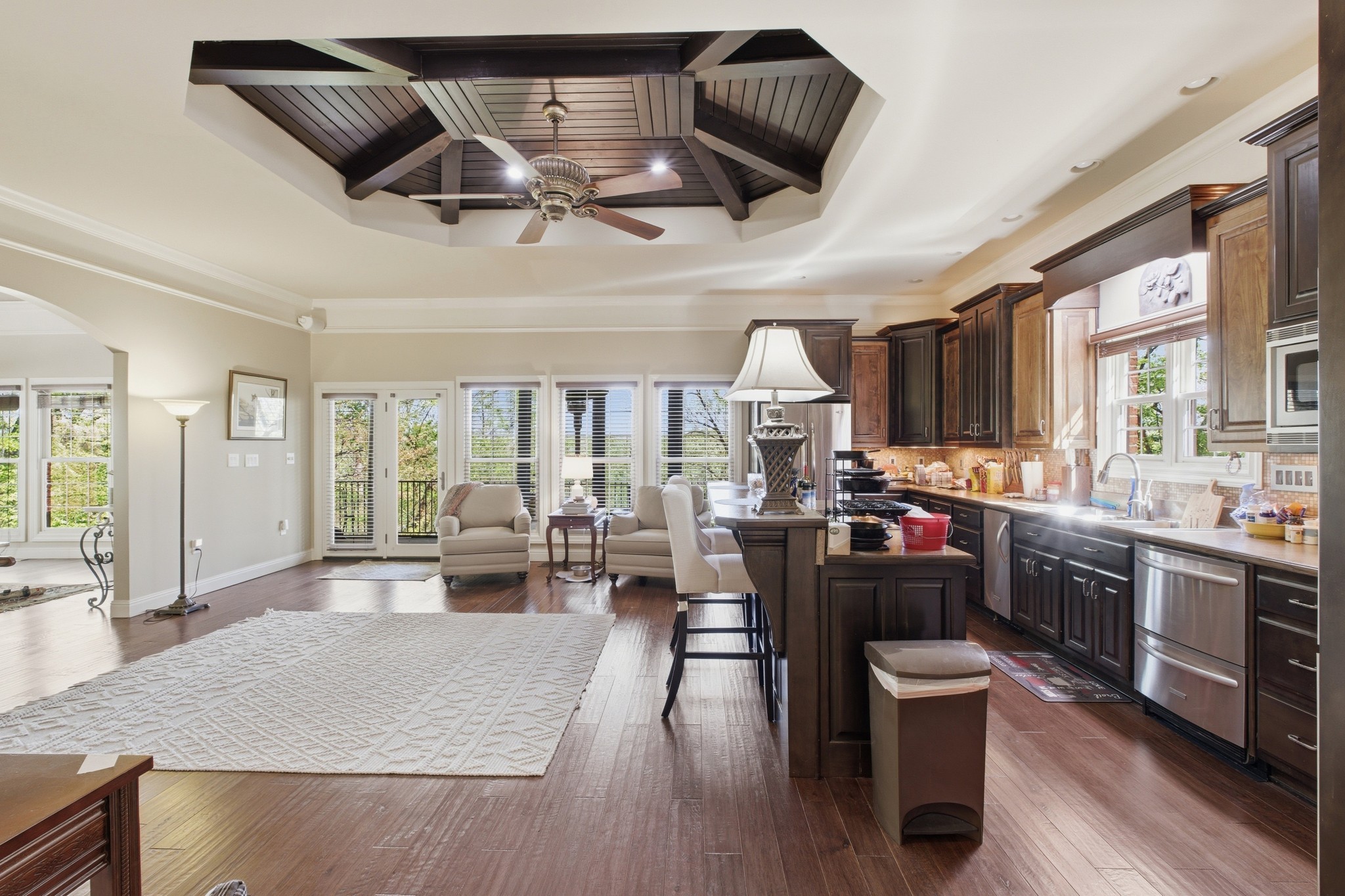 1605 Puryears Bend Road Hartsville, TN 37074 - Photo 23 of 63 a view of a dining room with furniture a kitchen and chandelier