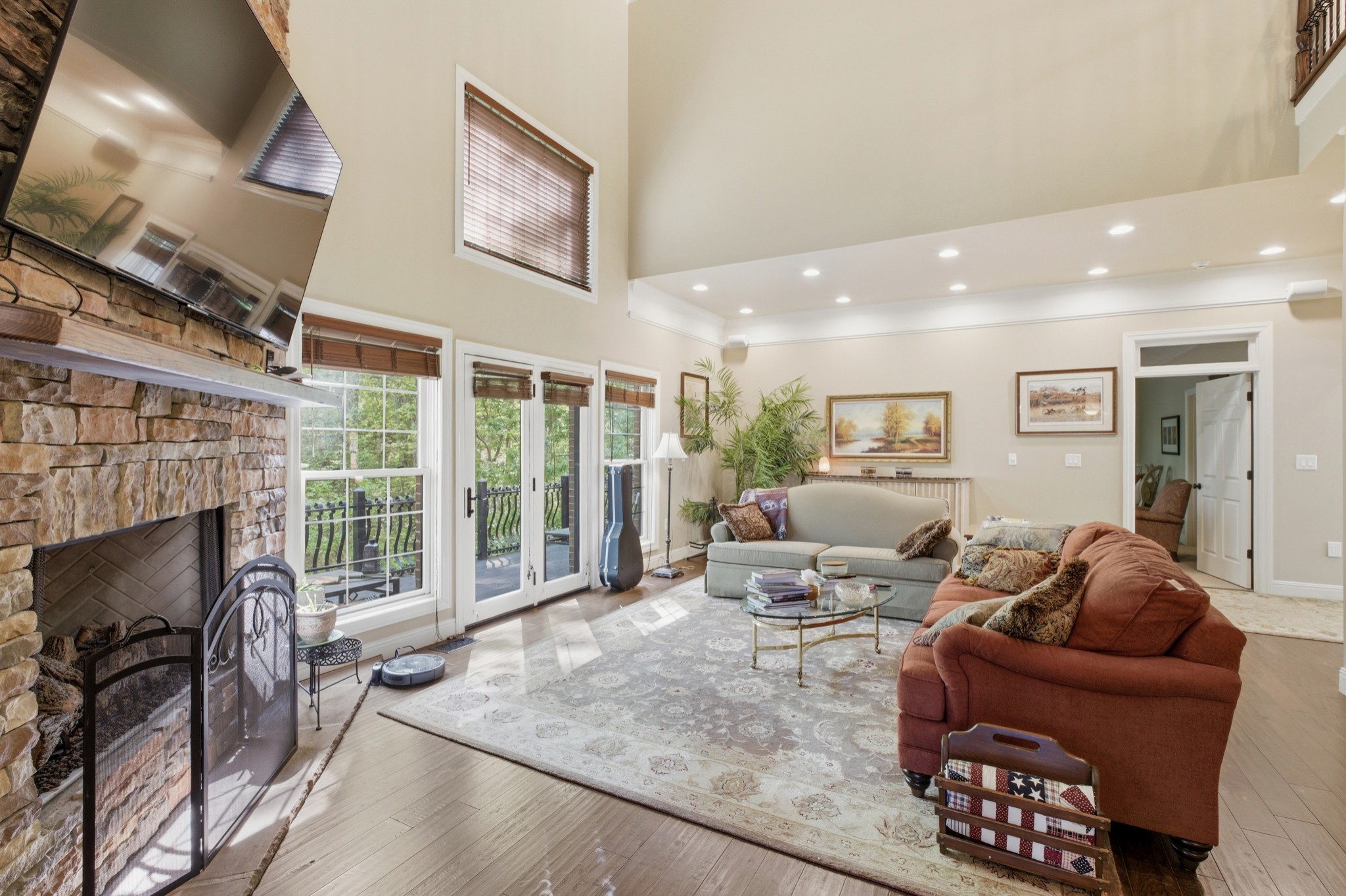 1605 Puryears Bend Road Hartsville, TN 37074 - Photo 27 of 63 a living room with furniture a fireplace and a flat screen tv