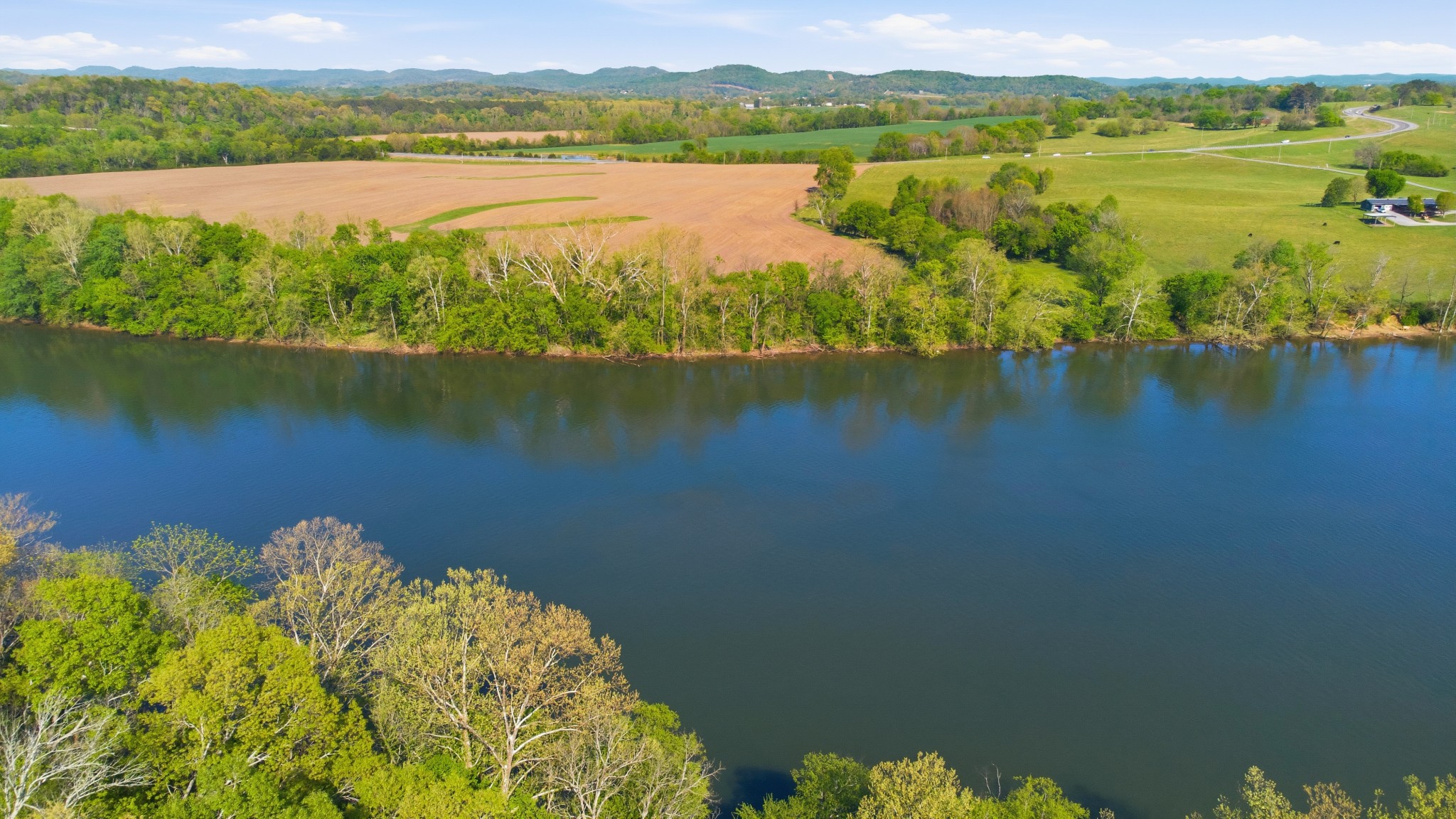 1605 Puryears Bend Road Hartsville, TN 37074 - Photo 52 of 63 a view of a lake with a mountain view