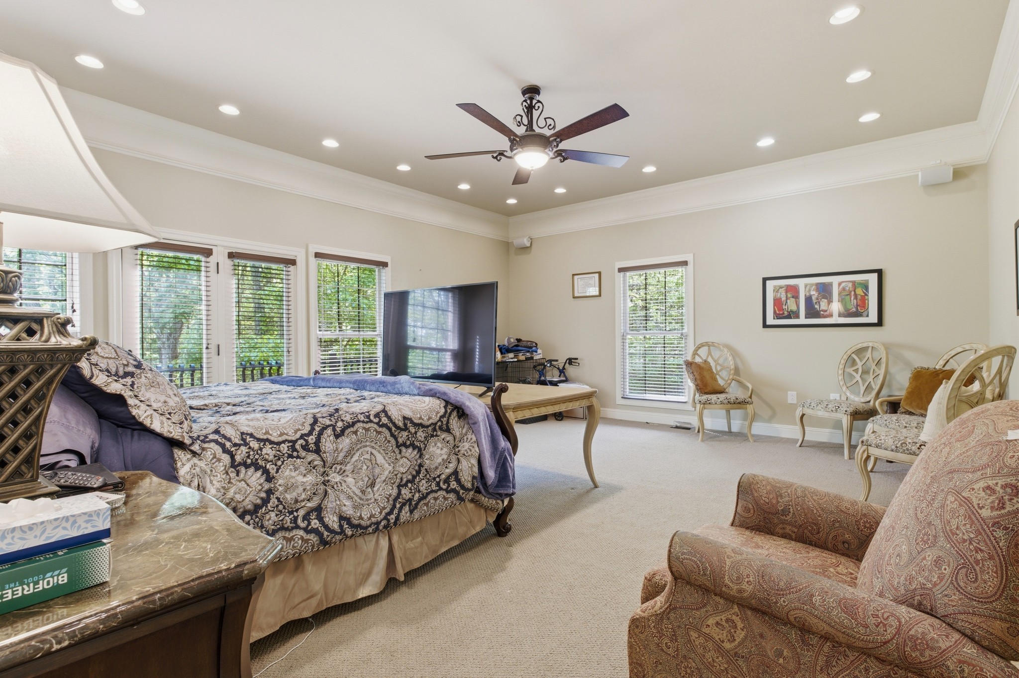 1605 Puryears Bend Road Hartsville, TN 37074 - Photo 8 of 63 a spacious bedroom with a bed a couch and dresser