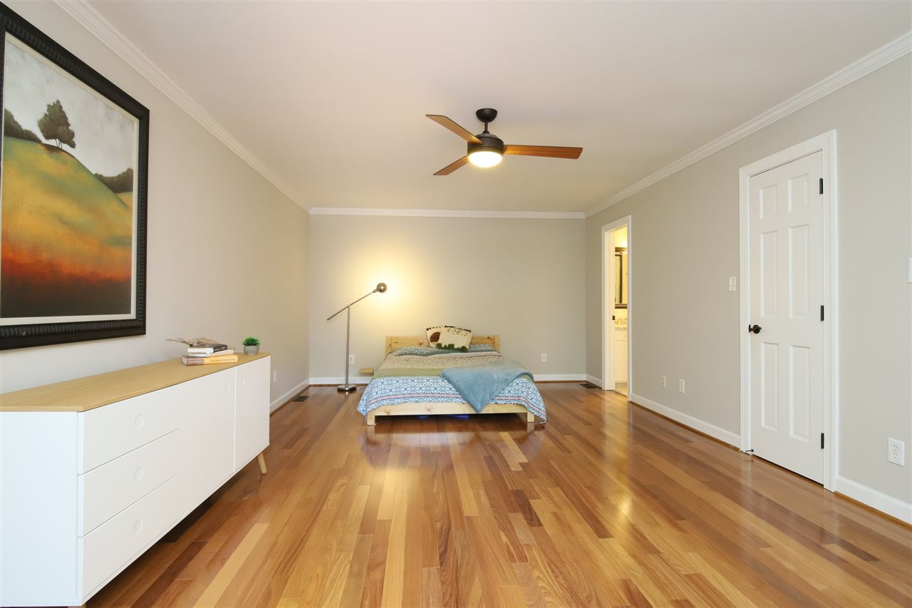 2800 Rue Sans Famille Raleigh, NC 27607 - Photo 15 of 27 Spacious Owners Suite w/ Beautiful Wood flooring throughout
