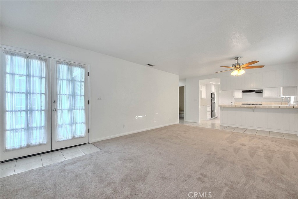2015 Morgan Lane, Unit B Redondo Beach, CA 90278 - Photo 11 of 19 a view of an empty room with a kitchen