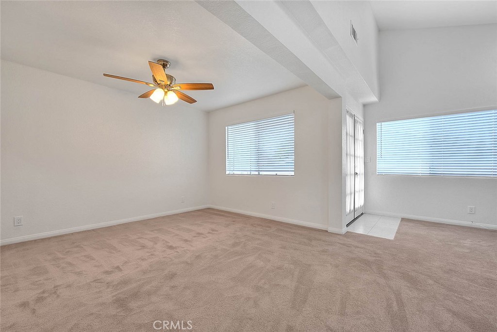 2015 Morgan Lane, Unit B Redondo Beach, CA 90278 - Photo 10 of 19 an empty room with windows and ceiling fan
