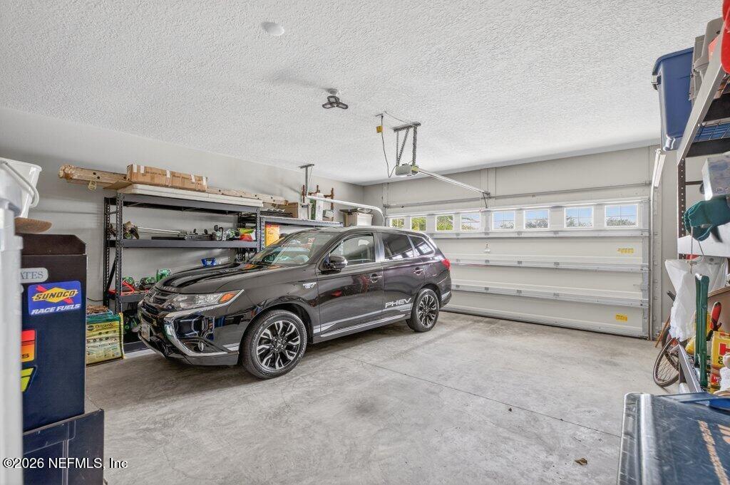 12 Wards Ravine Way St. Johns, FL 32259 - Photo 20 of 73 a car parked in a garage