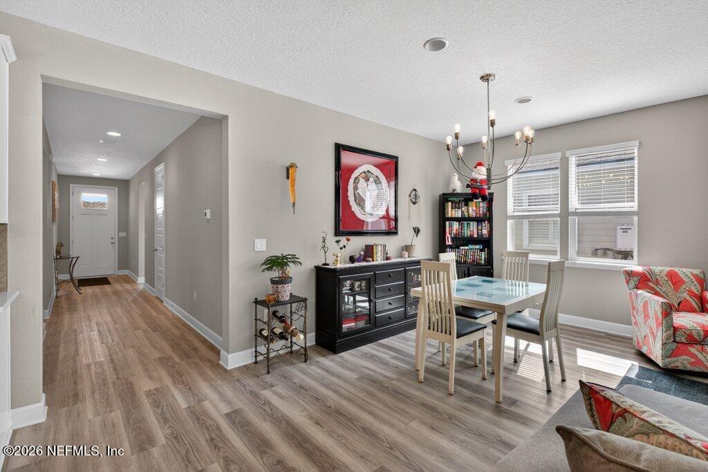 12 Wards Ravine Way St. Johns, FL 32259 - Photo 37 of 73 a view of a livingroom with furniture wooden floor and a window