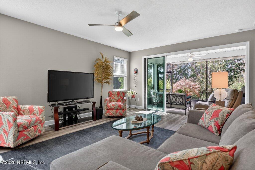 12 Wards Ravine Way St. Johns, FL 32259 - Photo 40 of 73 a living room with furniture and a flat screen tv