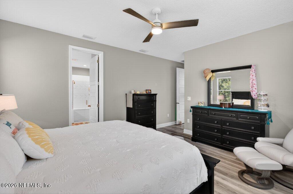 12 Wards Ravine Way St. Johns, FL 32259 - Photo 46 of 73 a bedroom with a bed and a dresser
