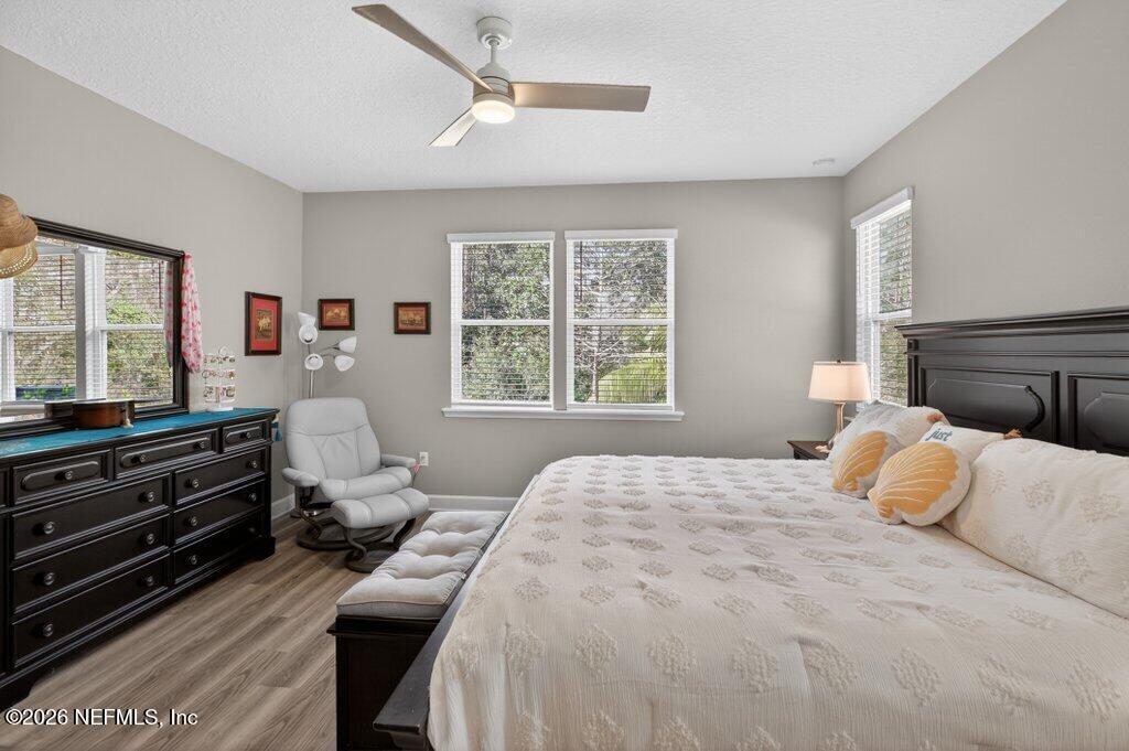12 Wards Ravine Way St. Johns, FL 32259 - Photo 47 of 73 a bedroom with a bed and wooden floor