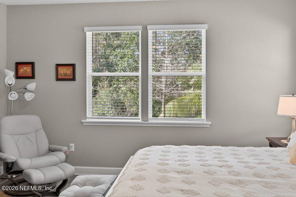 12 Wards Ravine Way St. Johns, FL 32259 - Photo 51 of 73 a bedroom with a bed and a couch