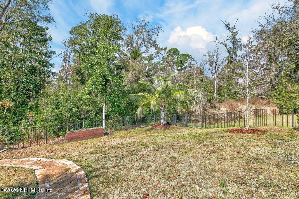 12 Wards Ravine Way St. Johns, FL 32259 - Photo 56 of 73 a backyard of a house with lots of green space