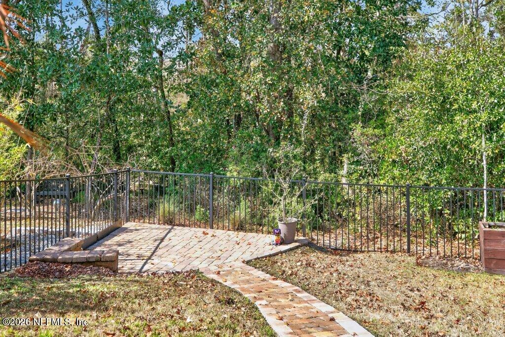 12 Wards Ravine Way St. Johns, FL 32259 - Photo 57 of 73 a lake view with a wooden fence