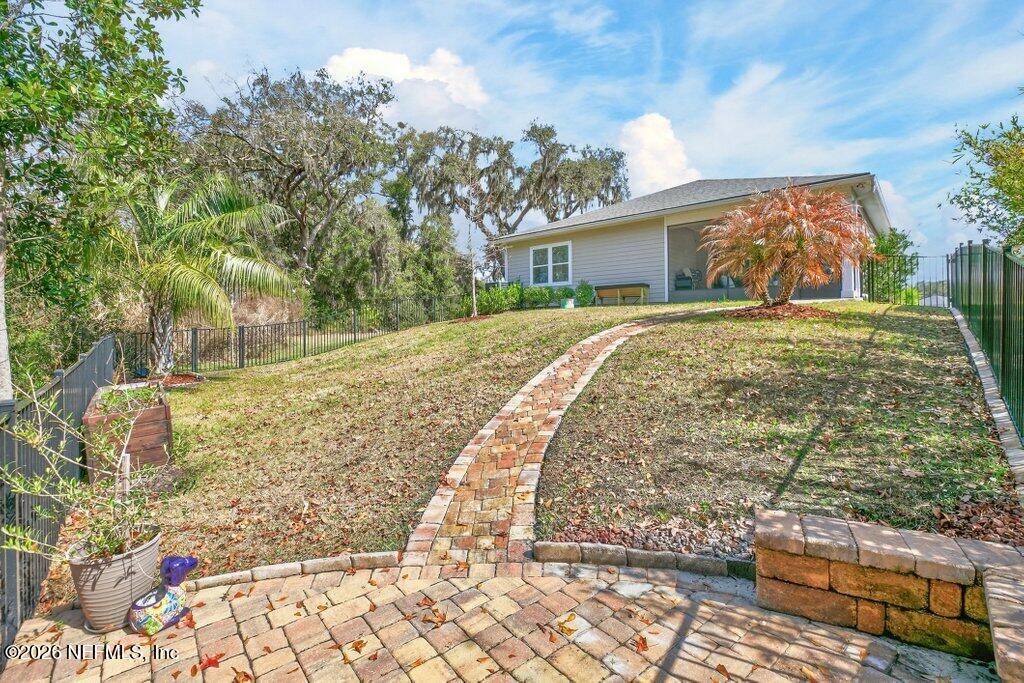 12 Wards Ravine Way St. Johns, FL 32259 - Photo 58 of 73 a front view of a house with garden
