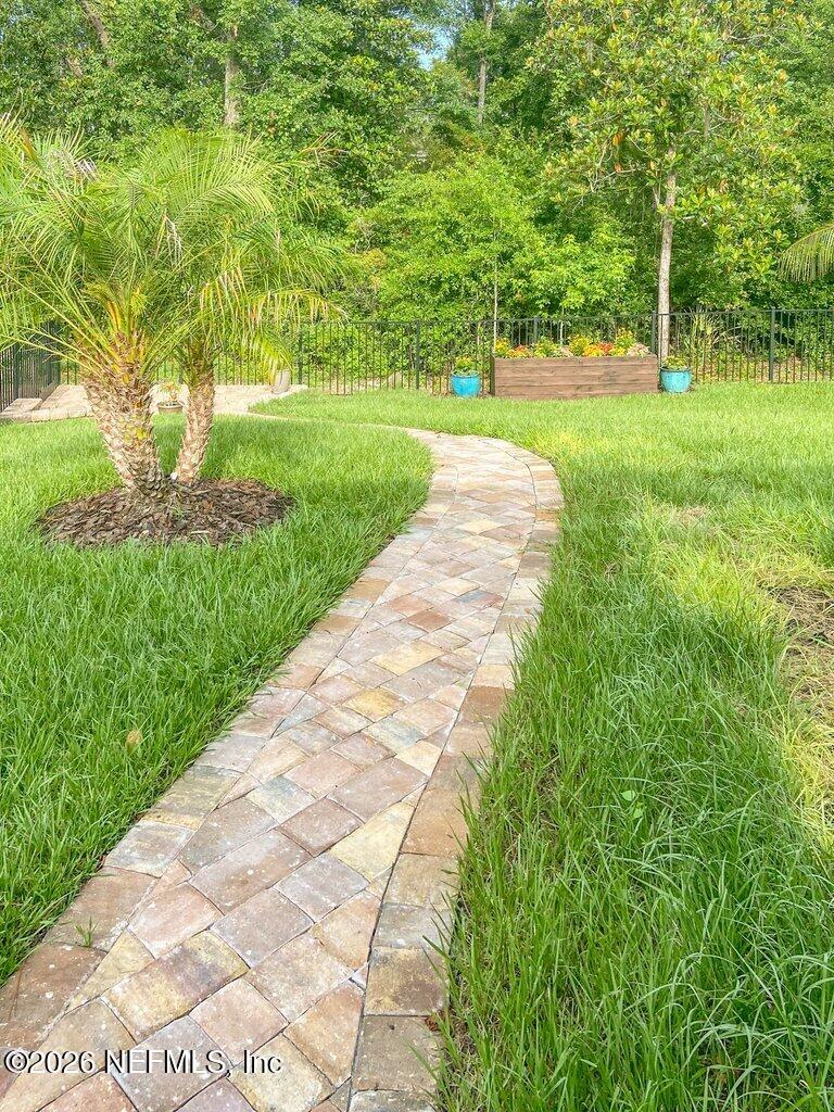 12 Wards Ravine Way St. Johns, FL 32259 - Photo 64 of 73 a view of a yard with plants and large trees