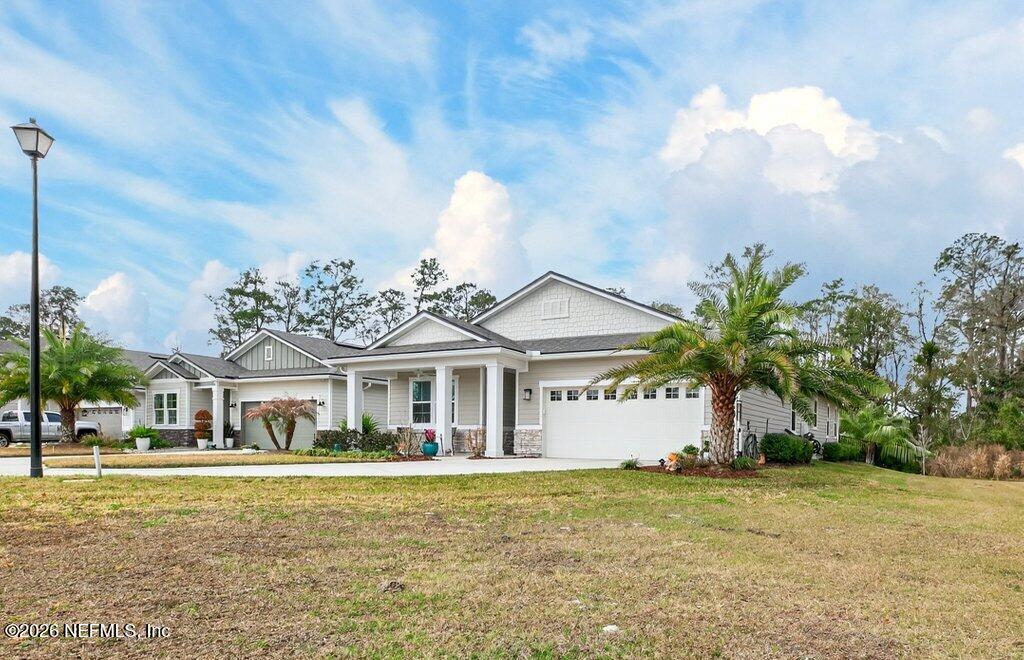 12 Wards Ravine Way St. Johns, FL 32259 - Photo 9 of 73 a front view of a house with garden