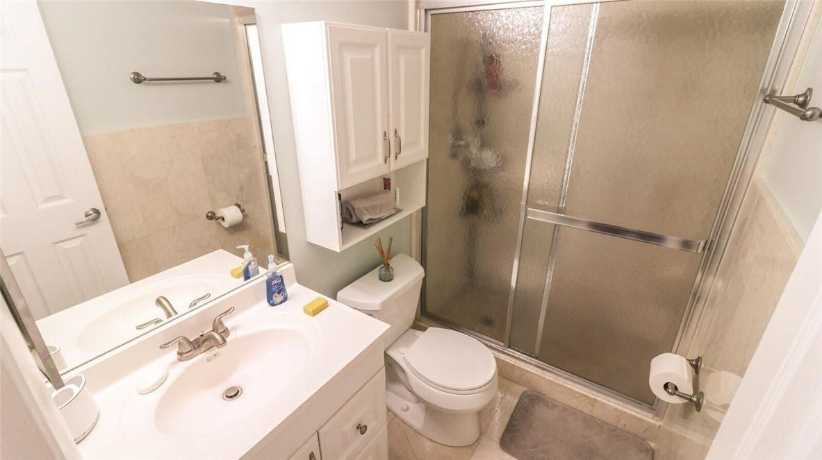 9220 Southwest 3rd Street, Unit 911 Boca Raton, FL 33428 - Photo 9 of 13 Master bathroom