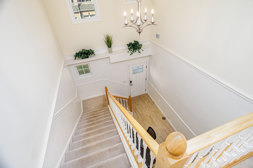 1221 Hazelwood Way, Unit 1221 Clinton, MA 01510 - Photo 22 of 42 a view of a balcony with furniture