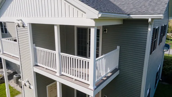 a view of a house with a deck
