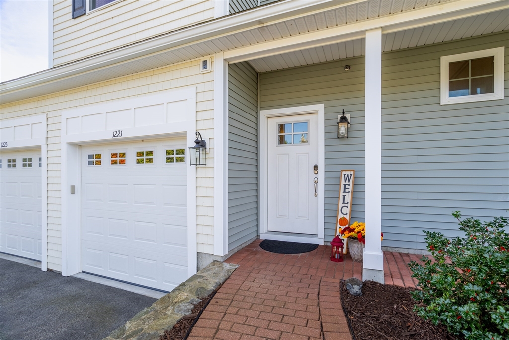 1221 Hazelwood Way, Unit 1221 Clinton, MA 01510 - Photo 41 of 42 a view of a entryway door of the house