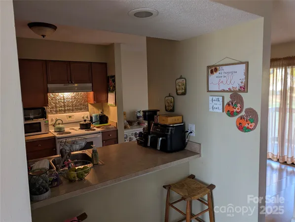 a room with furniture and a window