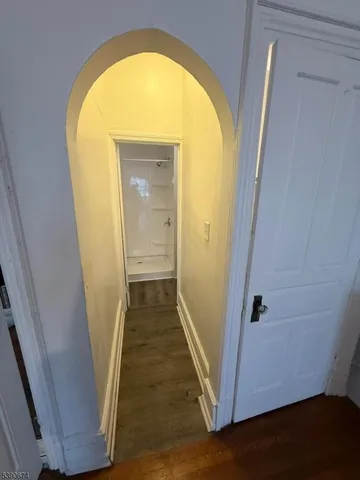 a bathroom with a bathtub and a toilet