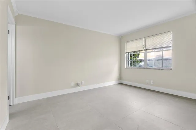 an empty room with a window