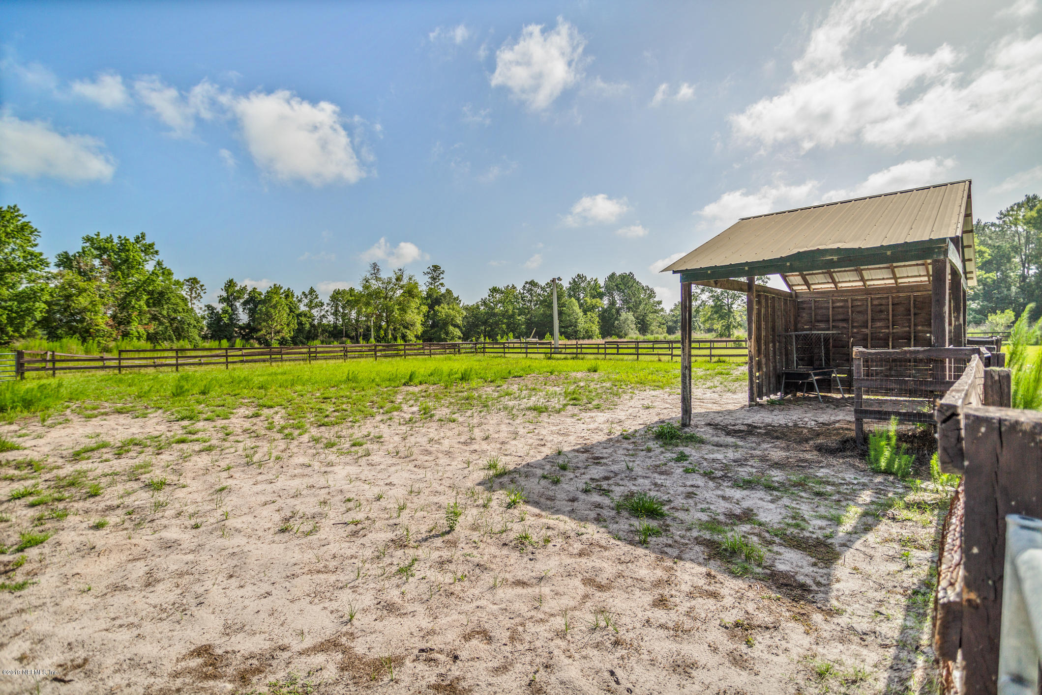 1397 Roberts Road St. Johns, FL 32259 - Photo 56 of 68 a view of a house with a yard and a large tree
