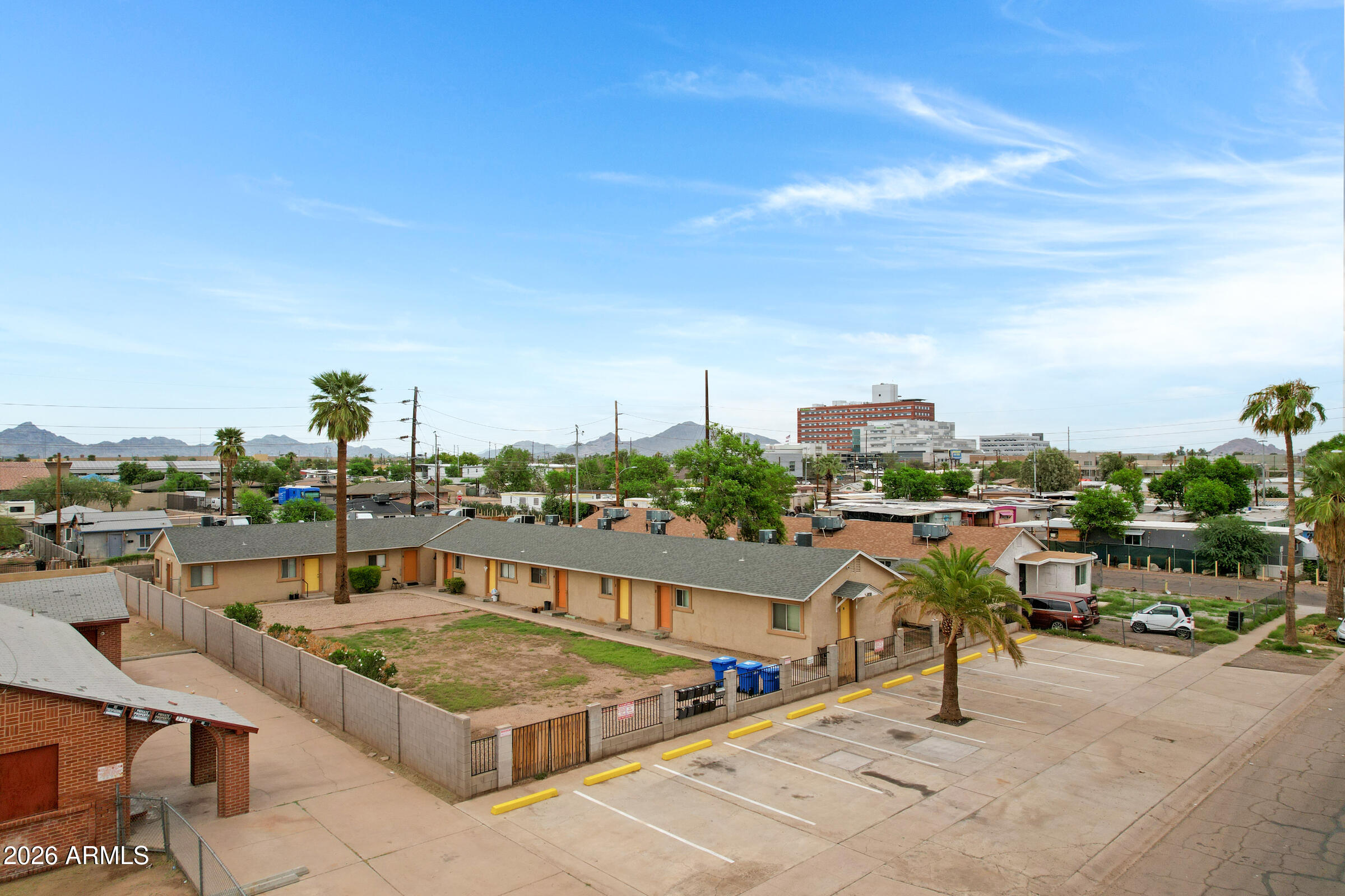 2238 East Taylor Street Phoenix, AZ 85006 - Photo 1 of 57 a view of a terrace with lawn chairs
