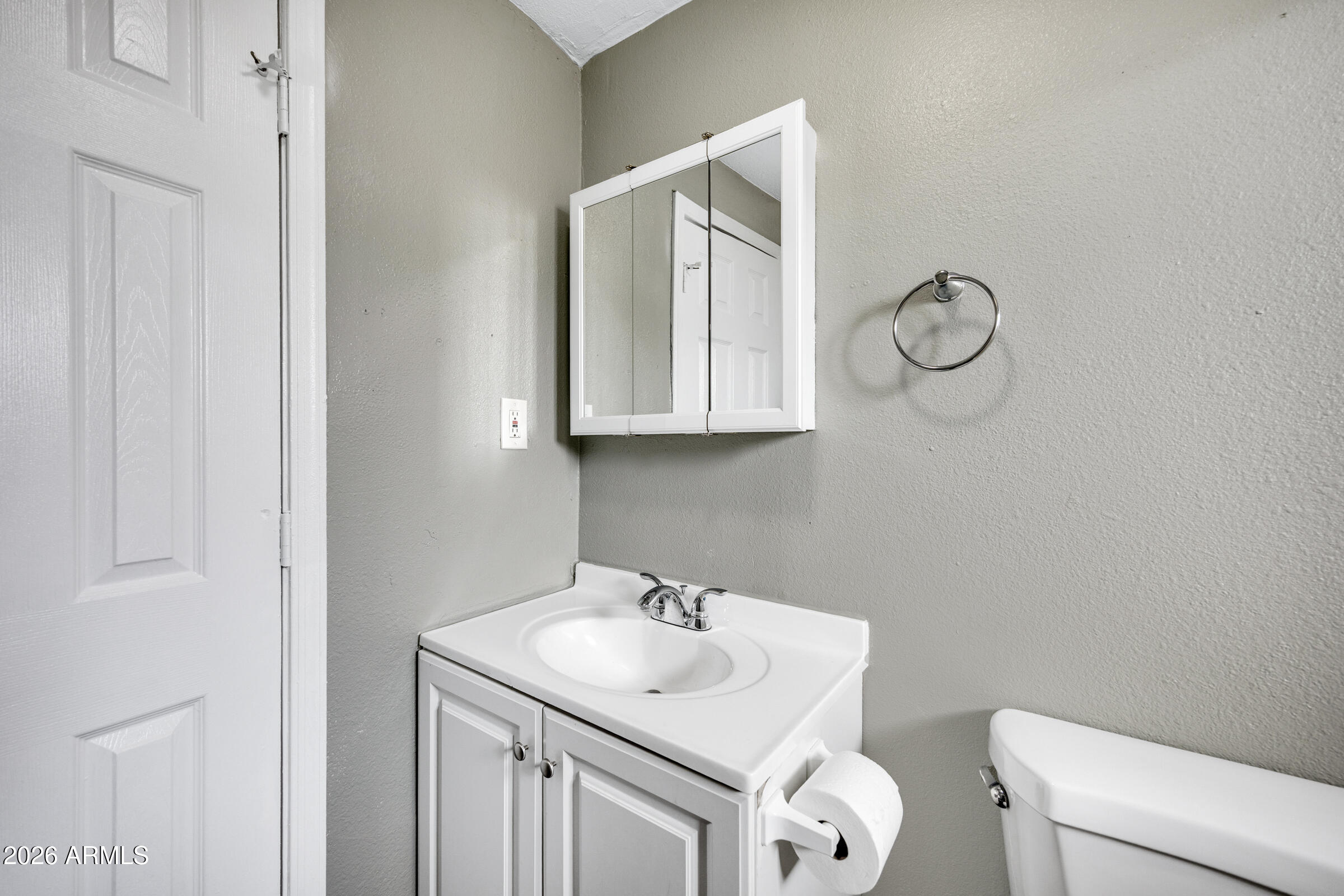 2238 East Taylor Street Phoenix, AZ 85006 - Photo 20 of 57 a bathroom with a sink and a toilet