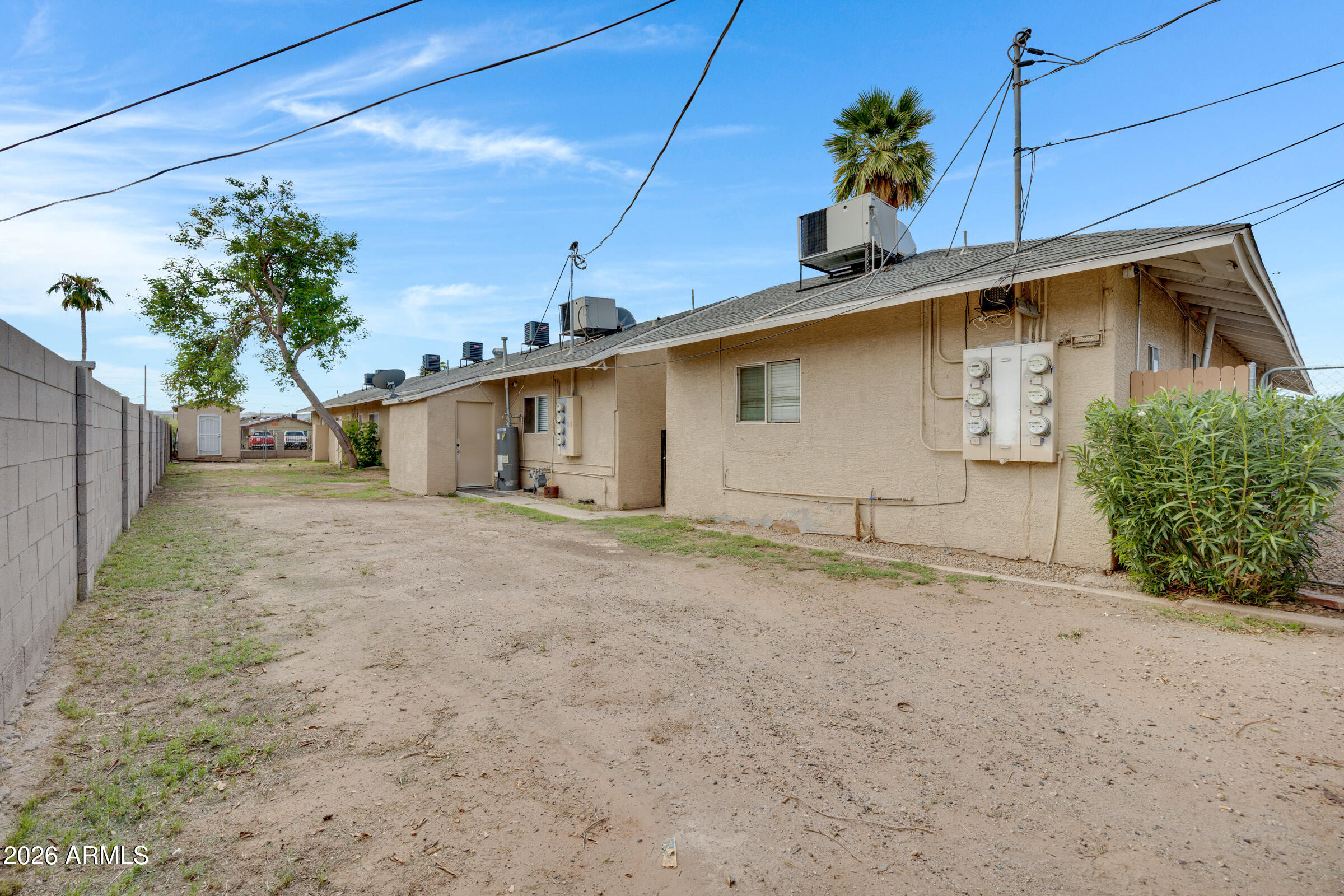 2238 East Taylor Street Phoenix, AZ 85006 - Photo 31 of 57 a house view with a backyard space