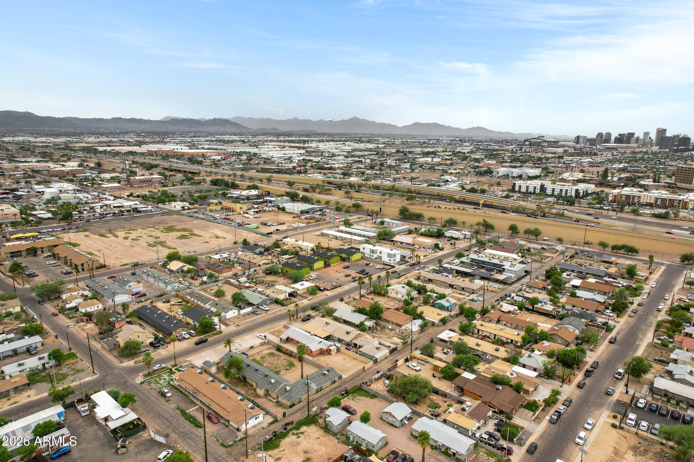 2238 East Taylor Street Phoenix, AZ 85006 - Photo 54 of 57 an aerial view of residential building with parking space