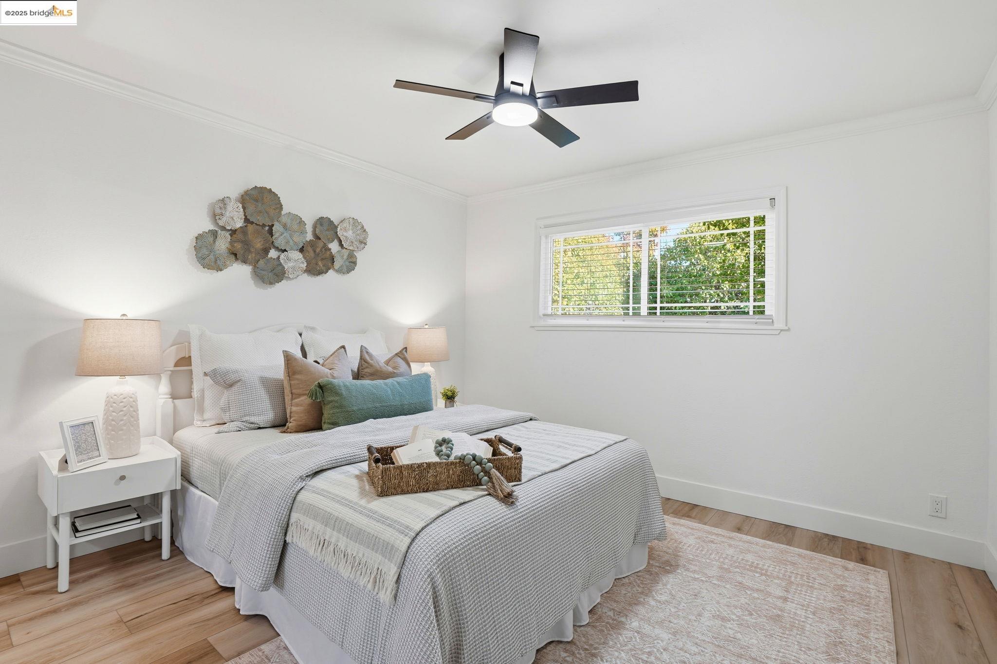 168 High Street Pacheco, CA 94553 - Photo 17 of 33 a bedroom with a bed and a chandelier