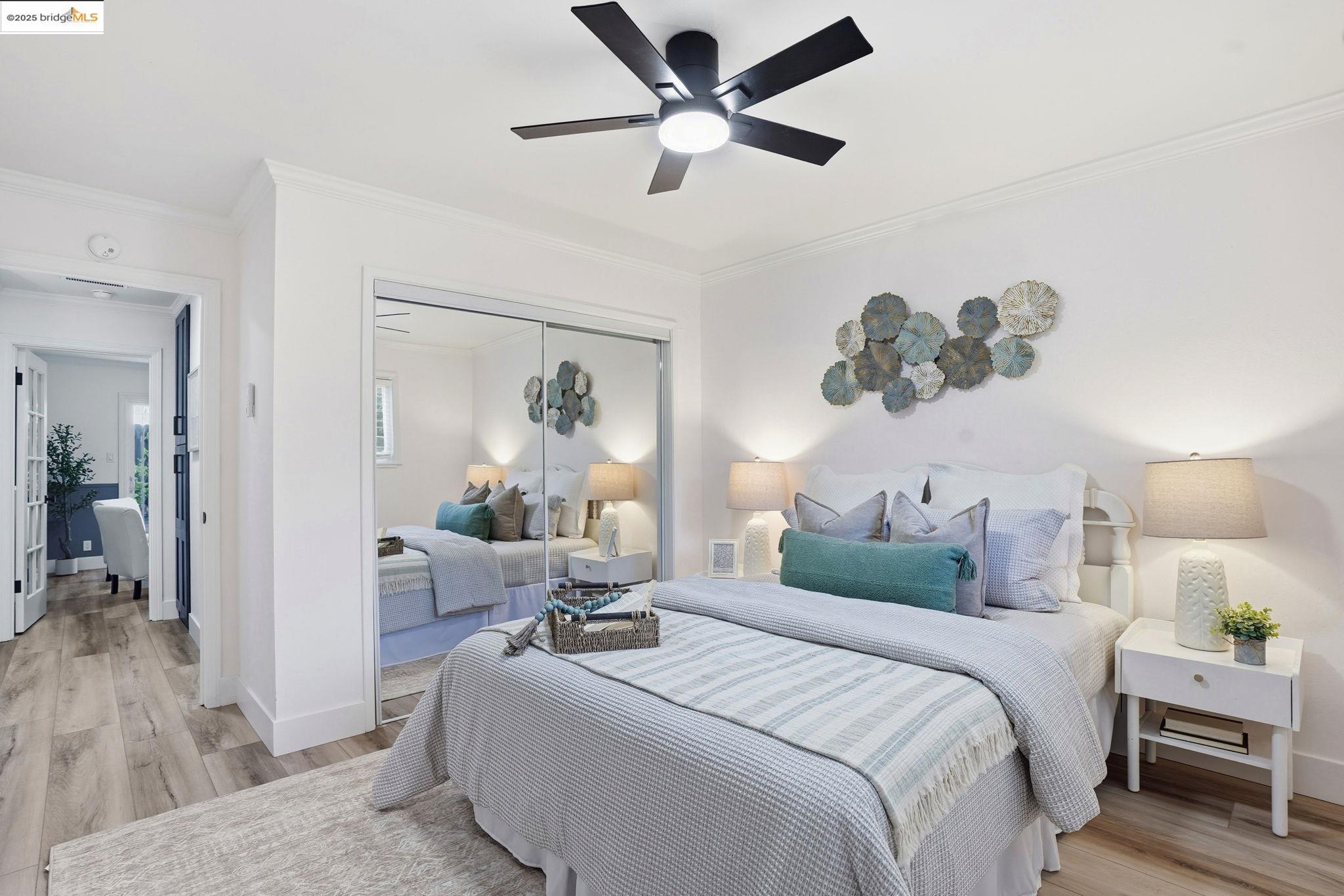 168 High Street Pacheco, CA 94553 - Photo 18 of 33 a bedroom with a bed and a chandelier